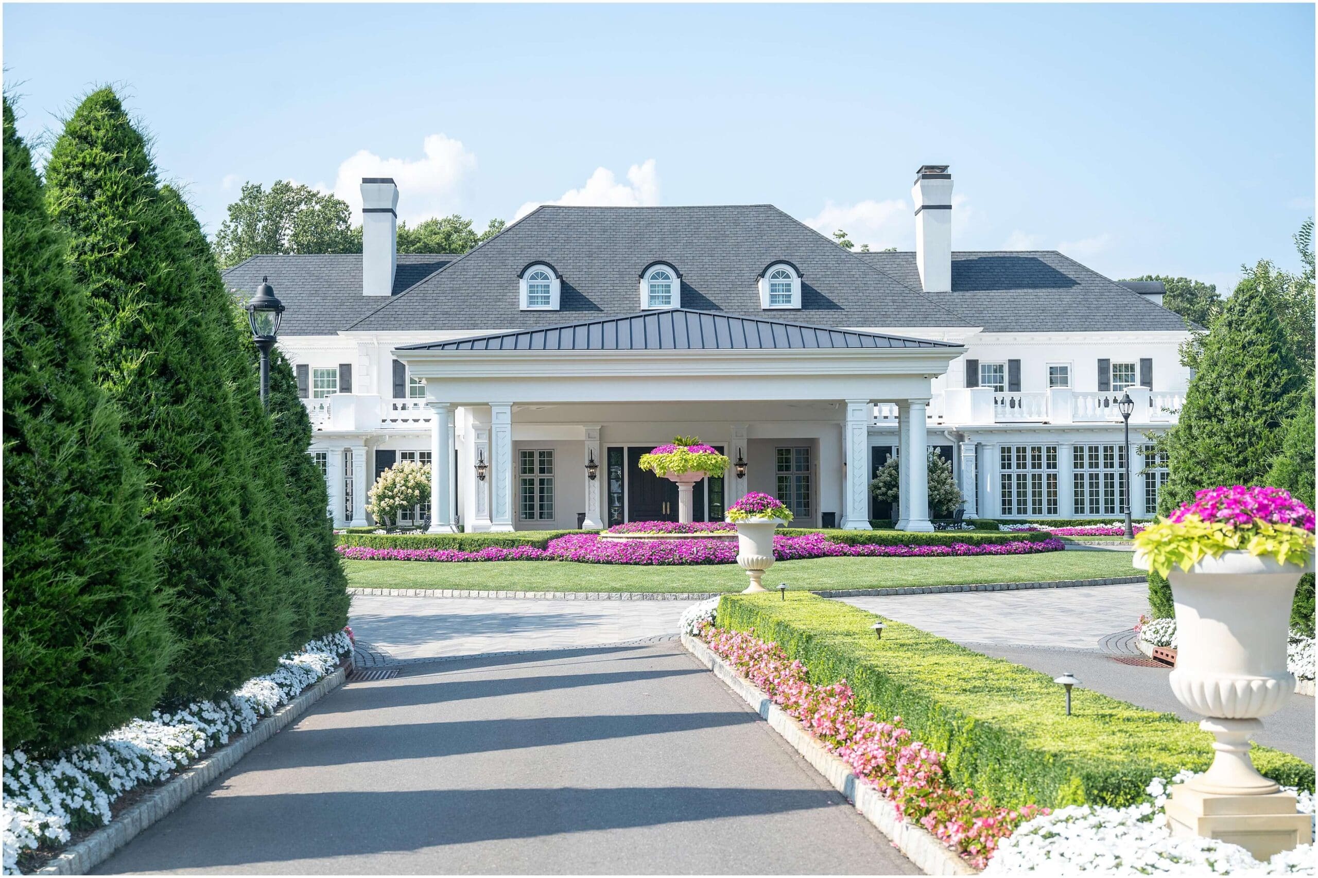 Details of the front facade and pink gardens of the Shadowbrook at Shrewsbury wedding venue