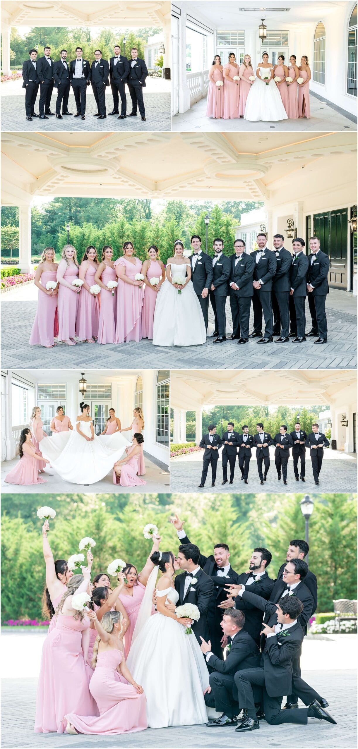 Newlyweds kiss and smile while standing with their pink and black wedding party